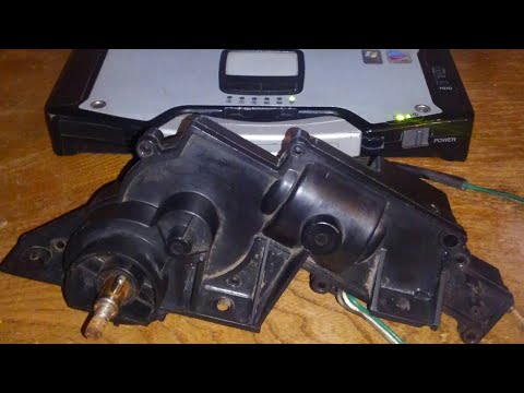 Видео: Диагностика и ремонт мотора фары Corvette C4
