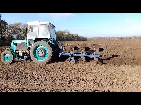 Видео: Трактор ЮМЗ 8040 и оборотный плуг ПОН 3-35