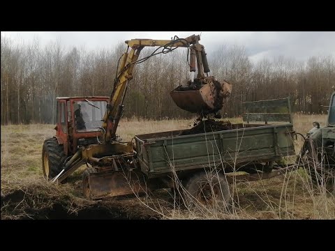 Видео: Погрузчик на базе самоходного шасси т16, погрузка торфа, самодельный трактор. Made in USSR vs 2021