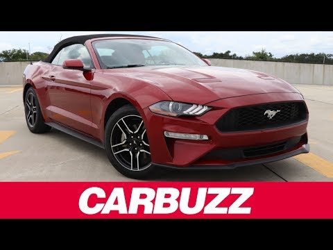 Видео: Тест-драйв Ford Mustang Convertible 2019 года: четырёх достаточно