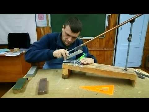 Видео: Заточка топора