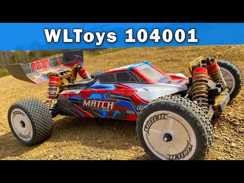 Видео: Обзор WLToys 104001 - радиоуправляемой багги 10 масштаба на коллекторном двигателе