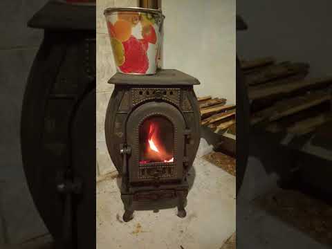 Видео: Печь сибирь чугунная со стеклом отопительная