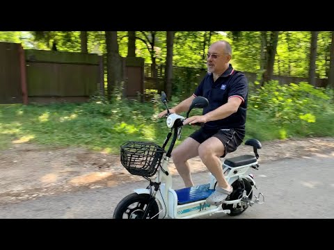 Видео: Обзор, тест и катание на электромопеде GreenCamel Тайфун 350