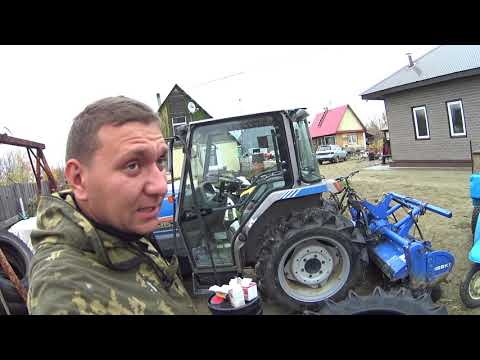 Видео: Японский трактор . ТО сколько стоит и что куда.