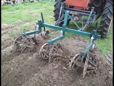 Видео: Трактор Т-16.  Прополка картофеля самодельными ежами.