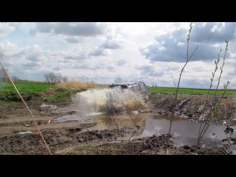 Видео: 2 Isuzu Bighorn, грязь, цепи, Град, Хабаровск