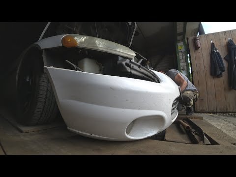 Видео: Ремонт Крайслера американца .Поменял рычаги.Поставил бампер