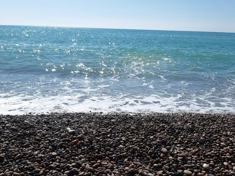 Видео: # 87 Moncofar (Moncofa) Галечный пляж в провинции Кастейон (Castellon)