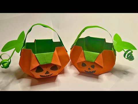 Видео: DIY бумажная корзинка в виде тыквы 🎃 | Простая идея оригами на Хэллоуин | Сделай корзинку для конфет