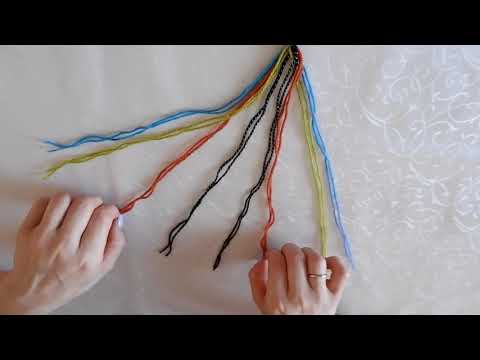 Видео: Мастер класс по плетению поясов из ниток.