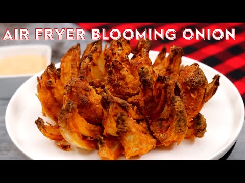 Видео: Внимание: этот хрустящий цветущий лук, приготовленный во фритюрнице, сведет вас с ума!
