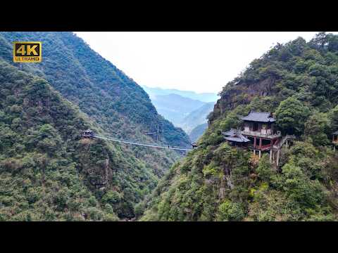 Видео: БЕЗУМНЫЙ поход по скалам в Китае! Тропа Хребта Дракона на высоте 1000 м