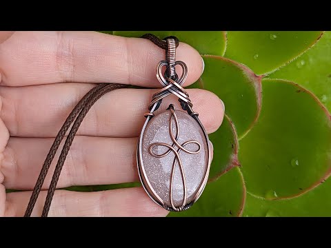 Видео: Мастер-класс по изготовлению подвески-кабошона с кельтским крестом и проволочной обмоткой