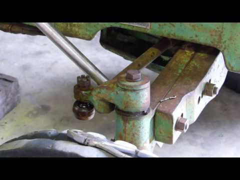 Видео: Ремонт поворотных пальцев, втулок и коленчатого рычага переднего моста John Deere 2030