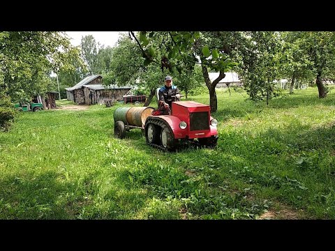 Видео: Самодельная бочка для полива огорода на гусеничный минитрактор.