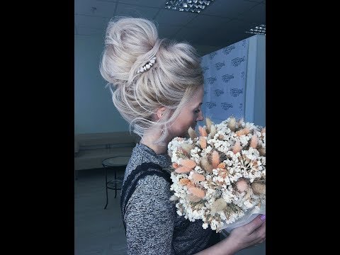 Видео: Как сделать высокий пучок на бублике? Прическа на выпускной
