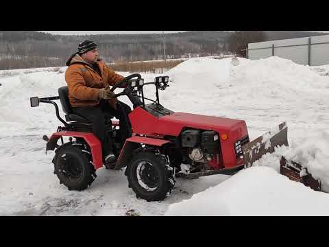 Видео: первая работа со снегом мтз 132 н