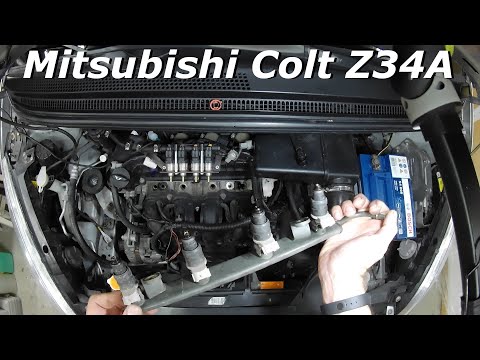 Видео: Mitsubishi Colt Z34A, 2006 г.в. Пропуски воспламенения("троит") на холодную. (Ч.2.)