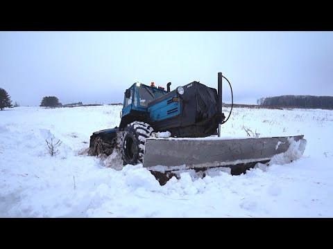 Видео: ТРАКТОР ЗАСТРЯЛ. ХТЗ Т-150  буксует. КИРОВЕЦ К-739 в помощь. Чистим снег. Работа техники зимой.