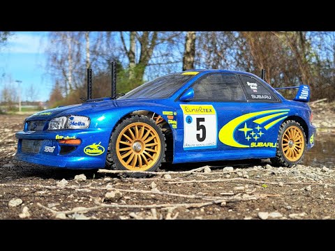 Видео: Subaru Impreza WRC 1999 - Tamiya 1/10 - Радиоуправляемая модель