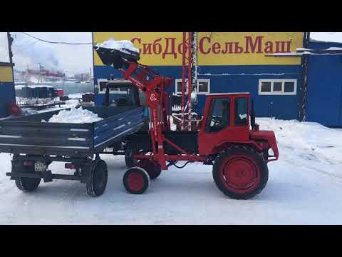 Видео: Погрузка снега ПЛ-0,4 на Т-16