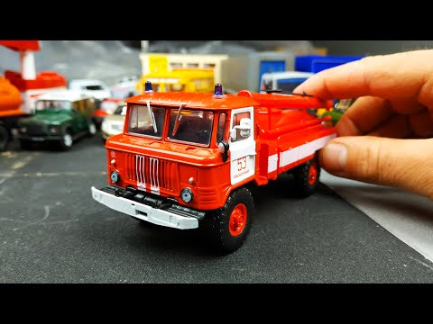 Видео: Модель грузовика ГАЗ 66 АЦ-30 пожарная машина 1/43! Модимио №19 распаковка и обзор! Про машинки!