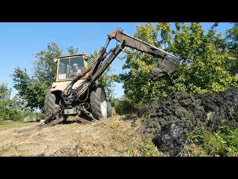 Видео: Копаем пруд в саду экскаватором ЮМЗ! Часть-1. Аn excavator digs a pond!
