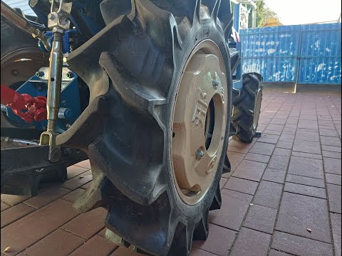 Видео: Утяжелители задних колес на японский минитрактор ISEKI TU160