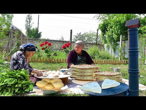 Видео: Готовим кутаб с зеленью и говяжьим желудком на костре | Традиционная деревенская кухня