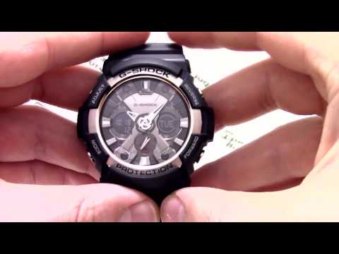 Видео: Часы Casio G-SHOCK GA-200-1A [GA-200-1AER] - Инструкция, как настроить | Watch-Forum.RU