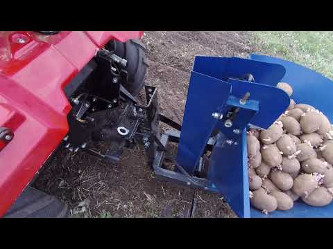 Видео: Митракс Т150. Вспашка почвофрезой и посадка картофеля.