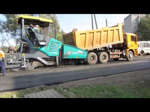 Видео: Работа асфальтоукладчика