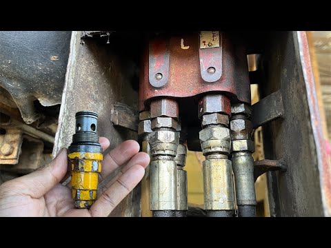 Видео: Управляющий клапан экскаватора, предохранительный клапан и главный предохранительный клапан