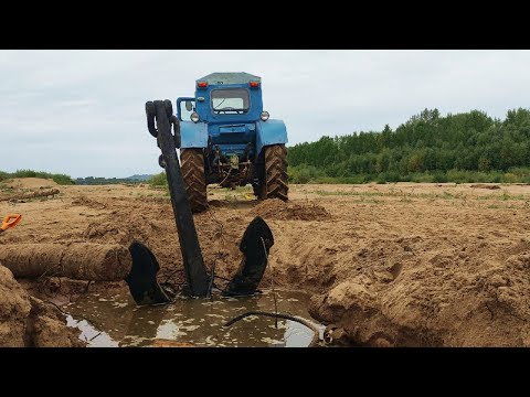 Видео: ТРАКТОР Т 40 ТЯНЕТ ЯКОРЬ⚓⚓⚓!ТОННА МЕТАЛЛА .Found an anchor