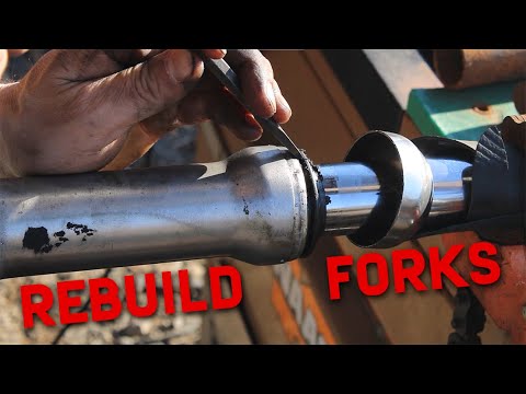 Видео: Как заменить сальники и втулки на передней вилке Harley Davidson (1987 и новее)