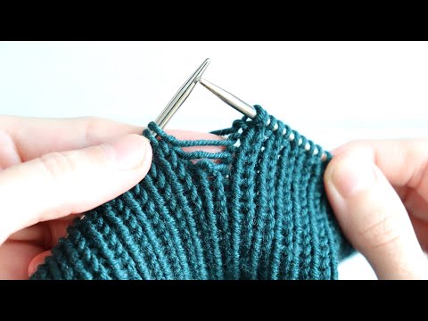 Видео: Как поднять спущенную петлю спицами