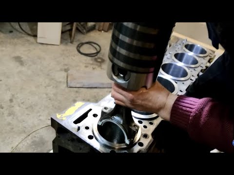Видео: Cat15. часть12. Установка поршней