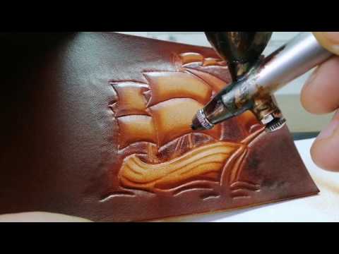 Видео: Процесс тиснения и покраски кожи растительного дубления