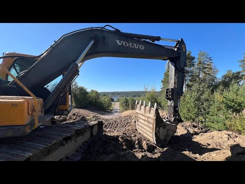 Видео: Перегревается экскаватор Volvo 210. Cтроительство дороги.