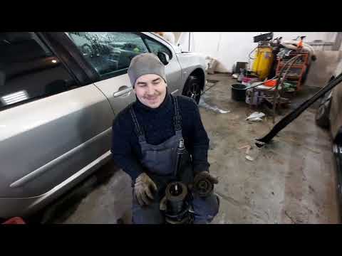Видео: Peugeot 307 SW Замена опоры передней стойки