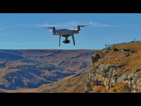 Видео: Поддержка с воздуха! Обзор и тест Phantom 4 Advanced