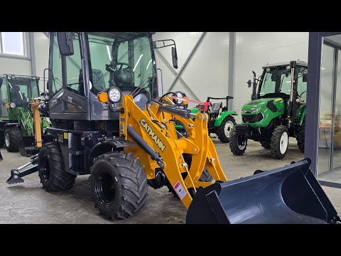 Видео: Погрузчик-экскаватор CAT-504