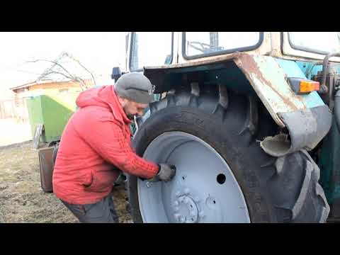 Видео: Цепи противоскольжения на ЮМЗ ЭО-2621, МТЗ-80, МТЗ-82.1 и другие трактора.