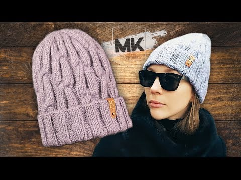 Видео: ШАПКА КОСАМИ НА РЕЗИНКЕ 3х3 / Подробный МК по вязанию женской шапки спицами