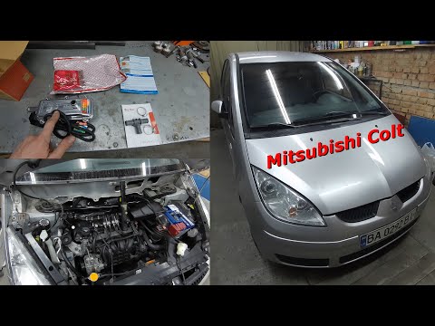 Видео: Mitsubishi Colt Z34A, 2006 г.в. Установка предпускового подогревателя.