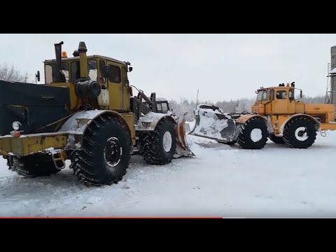 Видео: Трактор Кировец. Бью дорогу на скважину.  Тащу К-701 на ремонт.