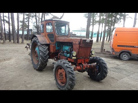 Видео: Ремонт трактора Т-40 АМ ч №3,замена масла.