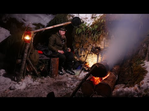 Видео: Походная кухня.  Ночь у скалы возле нодьи .Карелия.