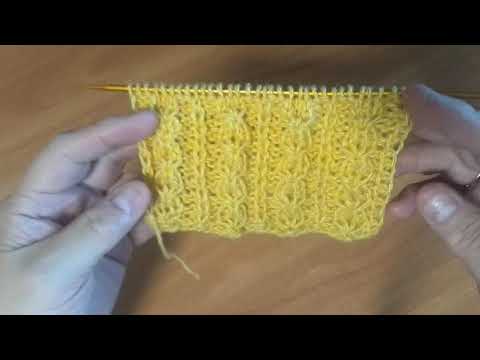 Видео: Миленький рельефный узор спицами